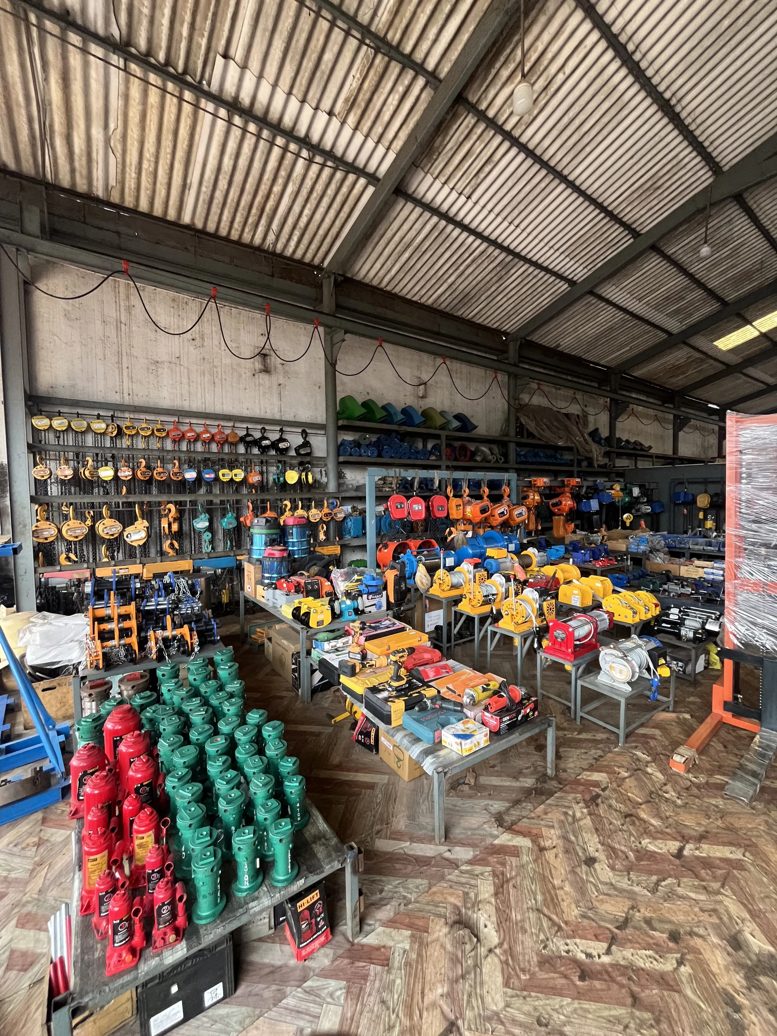 Bala Enterprise warehouse facility with hoists and winches stock.